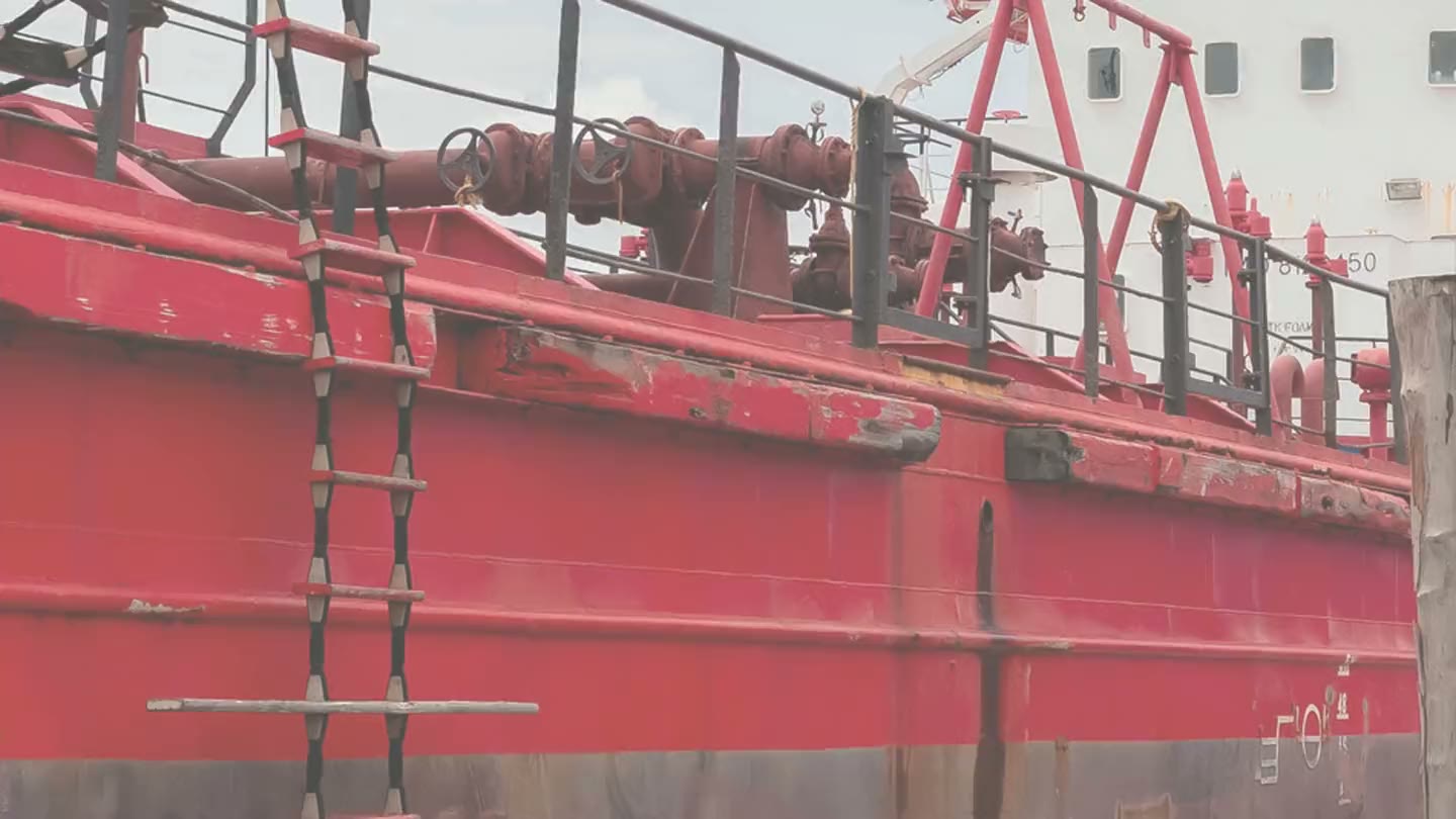 The cargo manifold and deck pipework of a GCITI tanker alongside the wharf in Guyana.