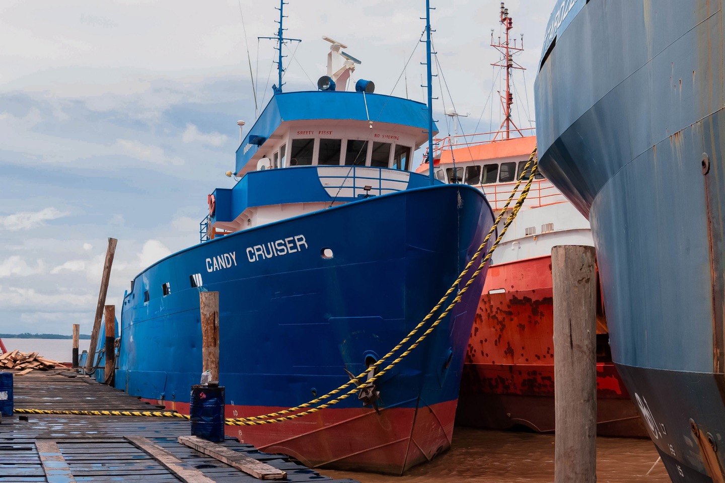 Candy Cruiser at the wharf in Guyana, with SAFETY FIRST and NO SMOKING stencilled on the wheelhouse front.